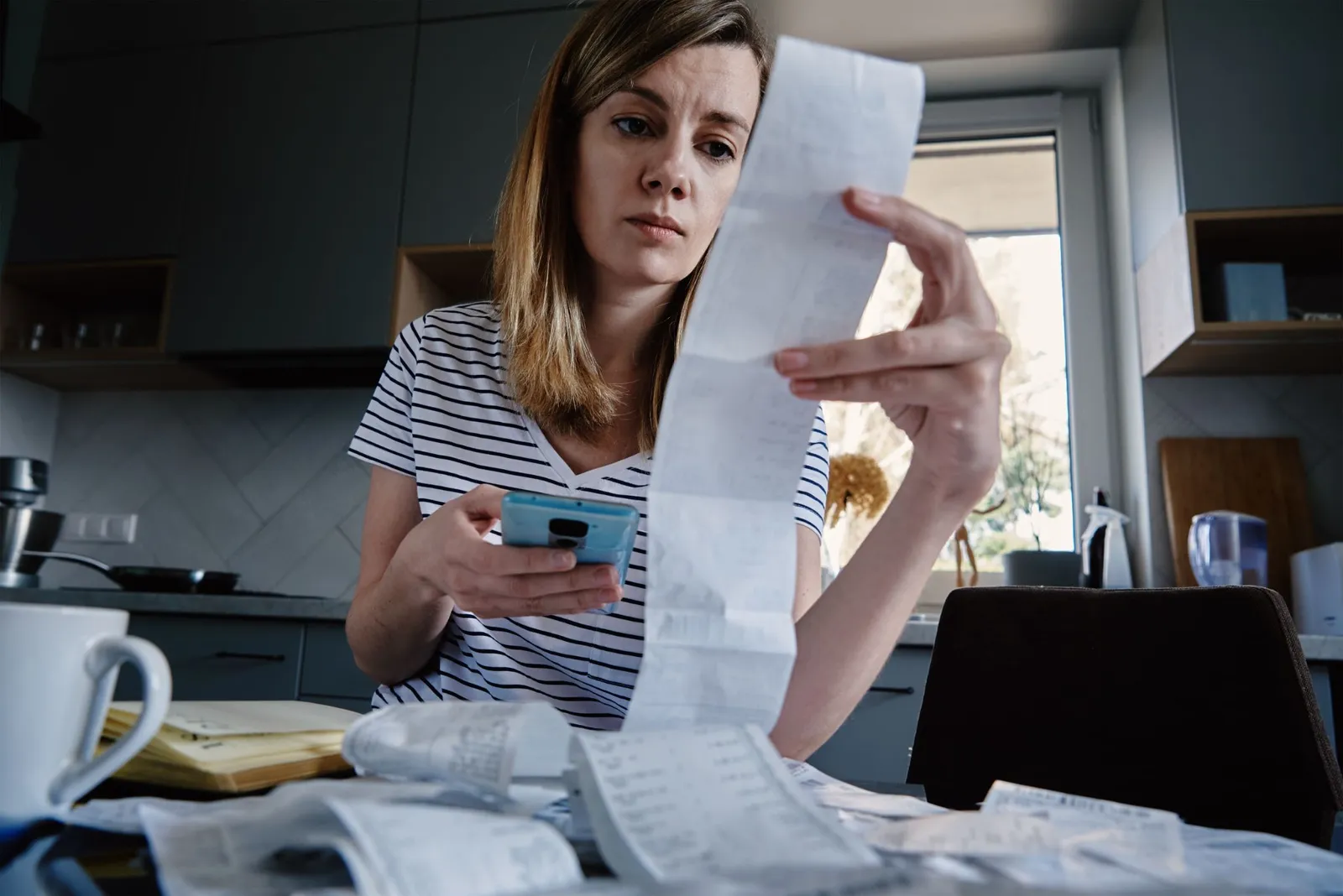 woman-reviewing-bills-while-on-irs-currently-not-collectible-status